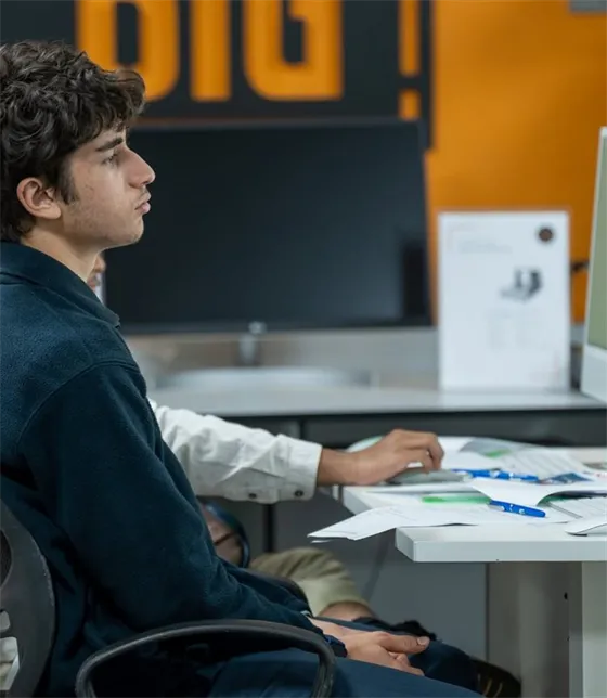 Student developing software in the innovation lab